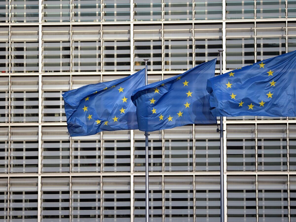    Флаги ЕС на фоне здания Европейского совета | © РИА Новости / Алексей Витвицкий
