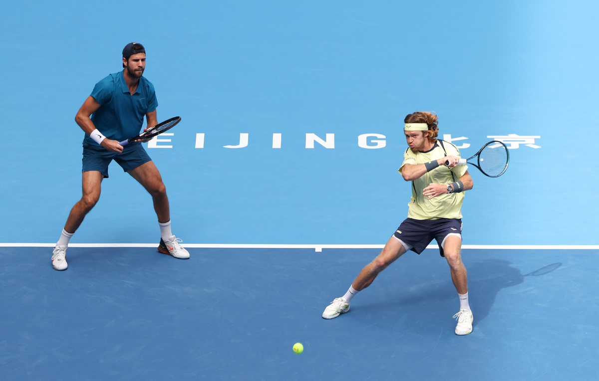    Карен Хачанов и Андрей Рублев  Emmanuel Wong/Getty Images