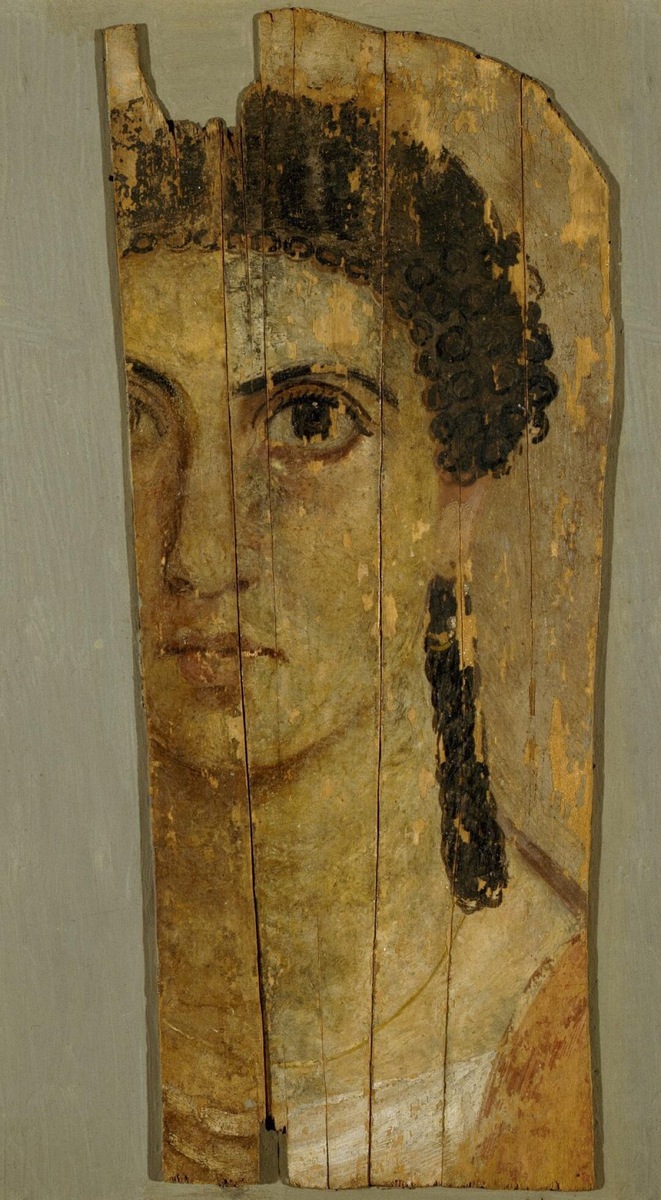    Портрет молодой женщины (четыре фрагмента фаюмского портрета). Египет. Вторая половина II века Фото: Изображение предоставлено Собака.ru Эрмитажем