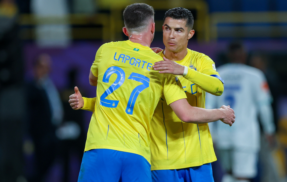    Эмерик Лапорт и Криштиану Роналду  Yasser Bakhsh/Getty Images