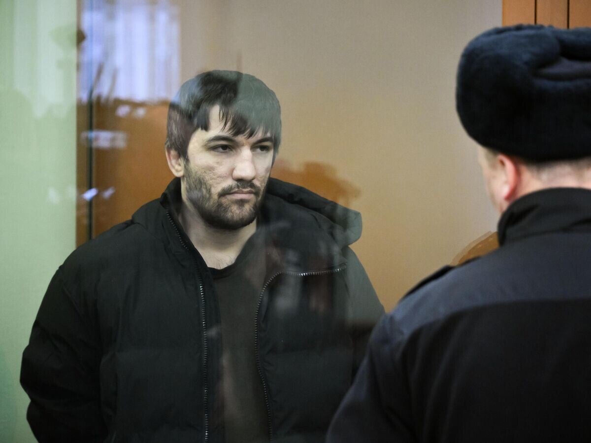    Боец смешанных единоборств ММА Ламберд Ахьядов, арестованный по подозрению в убийстве сотрудника Московской административной дорожной инспекции в центре Москвы, на заседании во Втором западном окружном военном суде в Москве | © РИА Новости / Владимир Астапкович