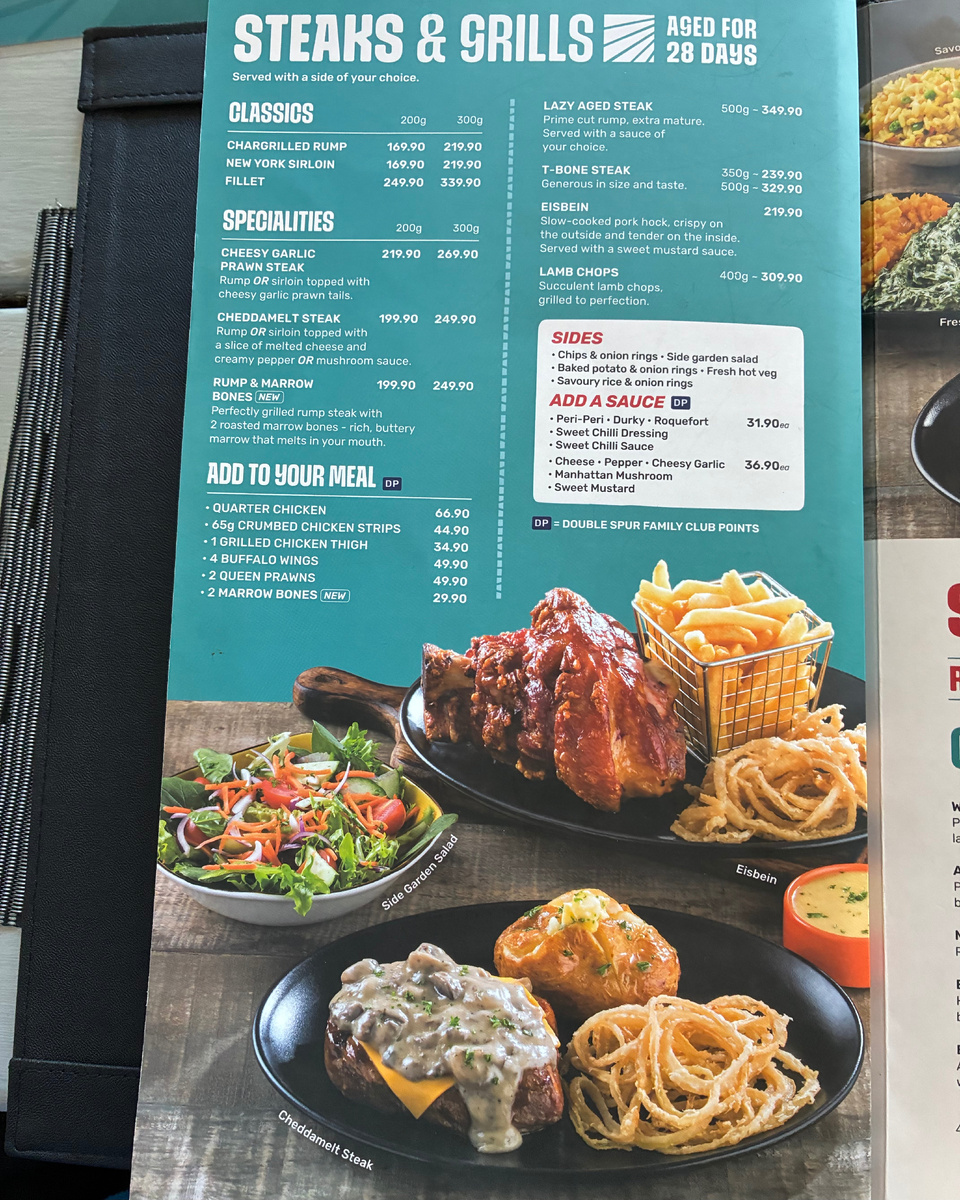 Меню ресторана «Юкон Спур» в ТЦ Вескас Молл во Фриденбурге, ЮАР. Фото из личного архива