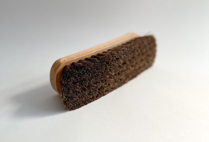 Щетка для чистки обрабатываемой поверхности