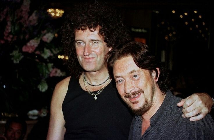 Брайан Мэй из Queen и Крис Ри. 