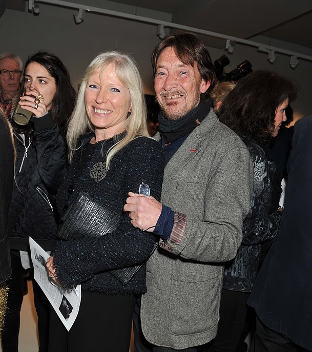    "Крис со своей женой Джоан в 2013 году"