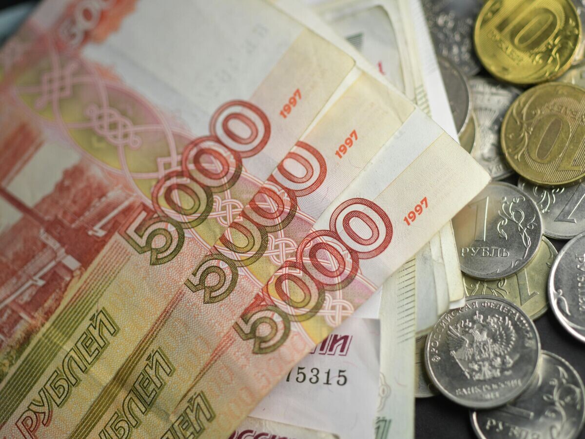    Денежные купюры и монеты© РИА Новости . Владимир Трефилов