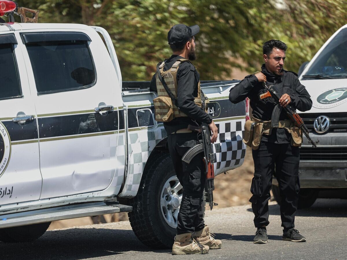    Сотрудники Сил внутренней безопасности Сирии в Сувейде | © AP Photo / Ghaith Alsayed