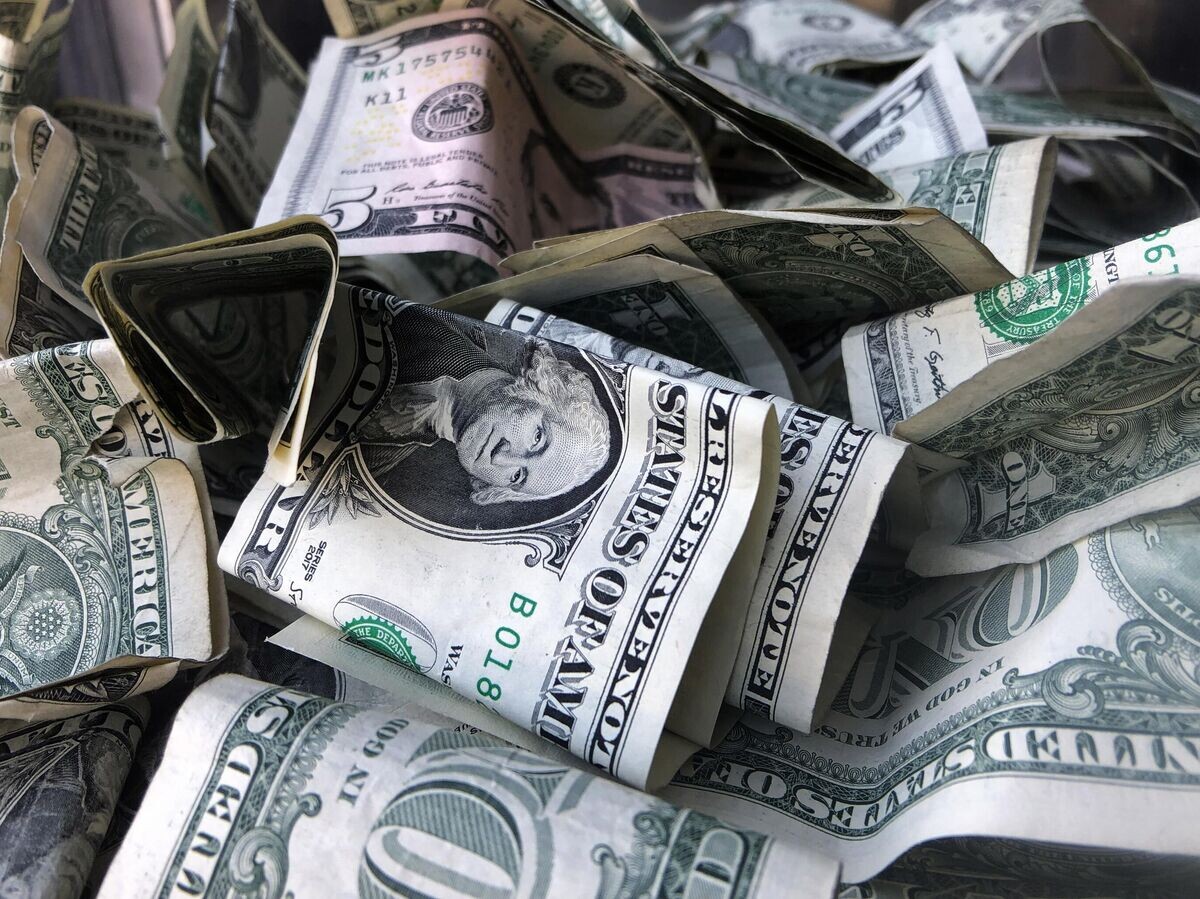    Долларовые купюры | © AP Photo / Mark Lennihan