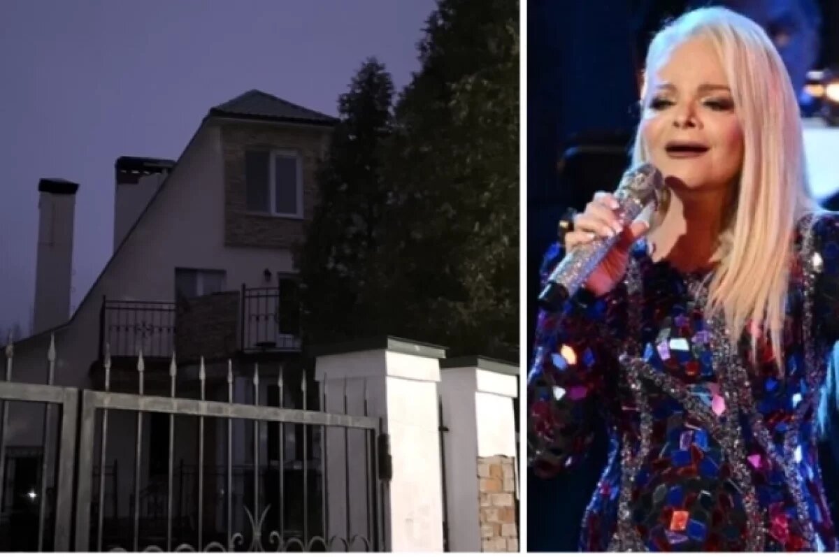    Дом звезды огорожен высоким металлическим забором с заостренными пиками.