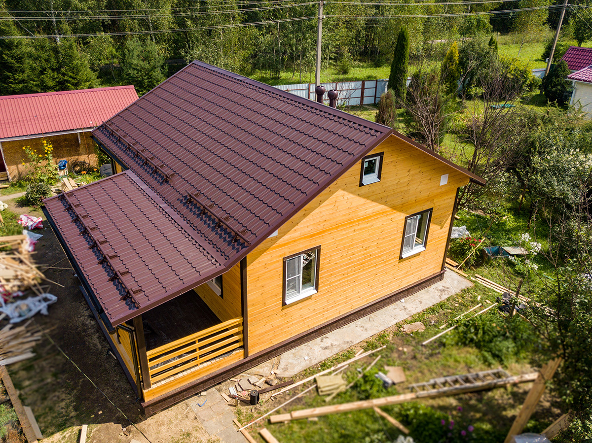 Одноэтажный каркасный дом 7х9 с открытой террасой 2,5х5