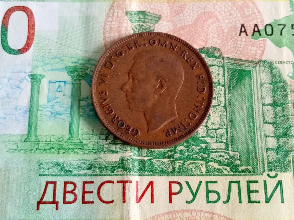 Монета, номиналом в 1 пенни, 1938 год. Фото Автора.