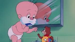 Карлик бреется 