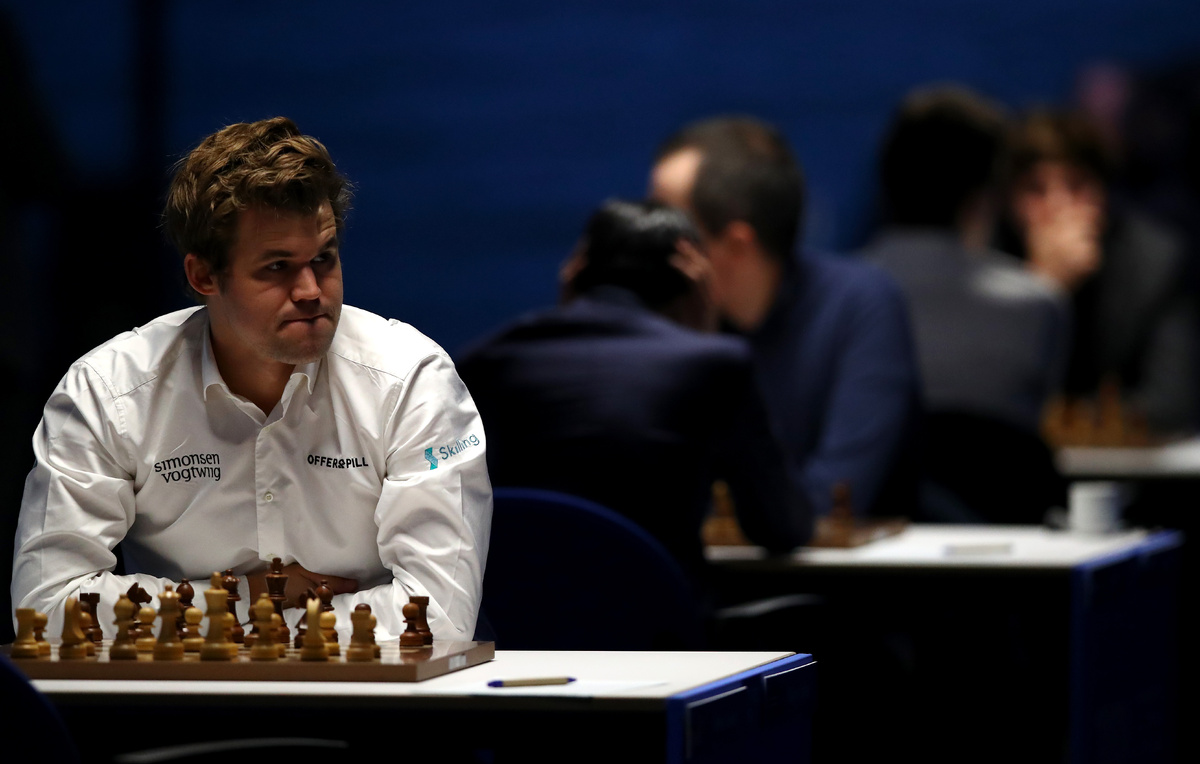    Магнус Карлсен  Dean Mouhtaropoulos/Getty Images