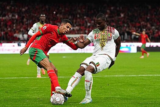 На фото sport.rambler.ru эпизод матча между Марокко и Мали