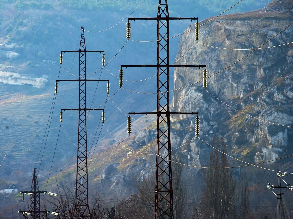    Линии электропередач© РИА Новости . Сергей Мальгавко