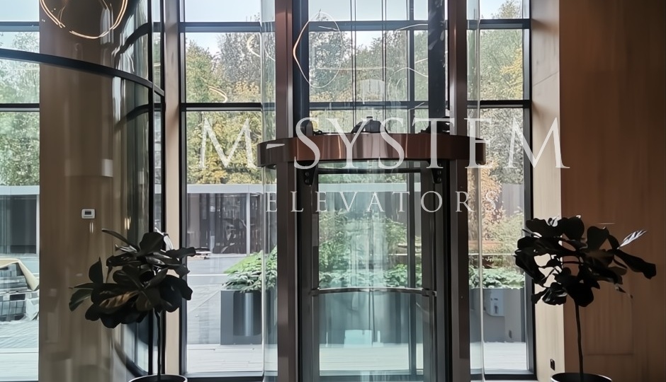 Не просто подъем: как панорамный лифт стал сердцем стильного лобби в ENITEO.