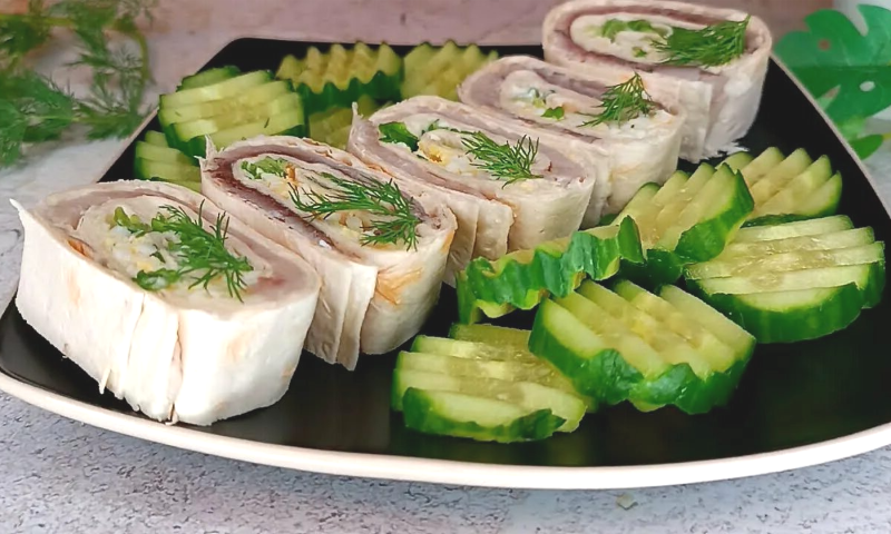 Рулеты с плавленым сыром и селедкой