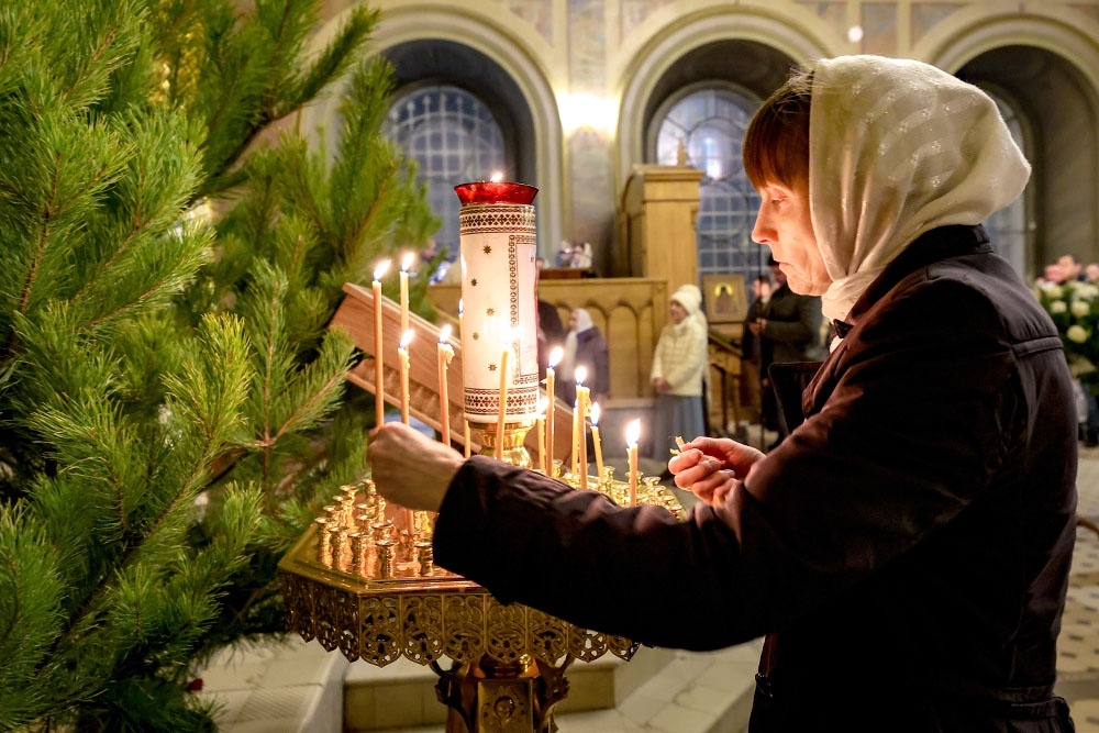    У православных христиан суть праздника заключается в открытии Бога людям через его человеческое воплощение. / Фото: Александр Рюмин / ТАСС