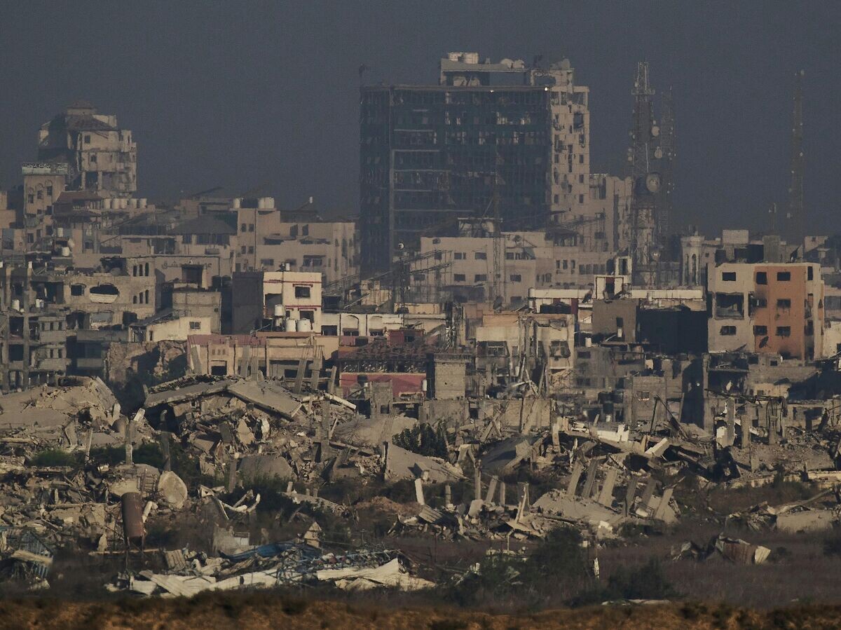    Разрушенные здания в секторе Газа | © AP Photo / Leo Correa