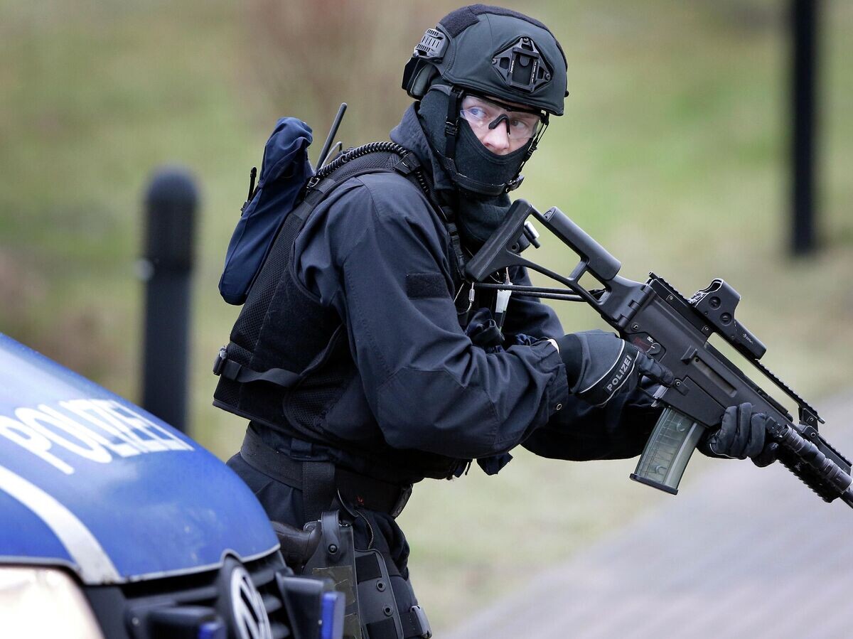    Офицер полиции в Германии | © AP Photo / Michael Sohn