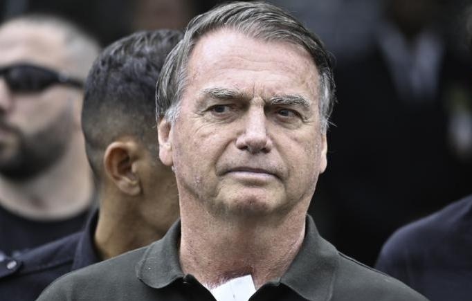    Жаир Болсонару  Ton Molina/ Getty Images