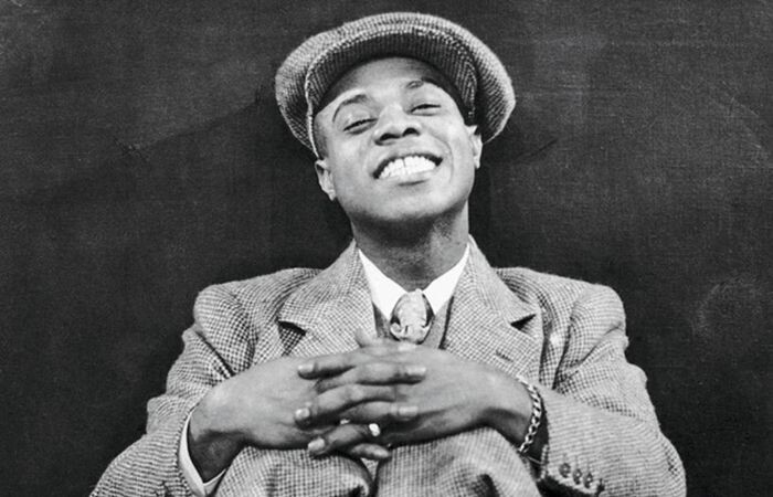 Луи Армстронг.