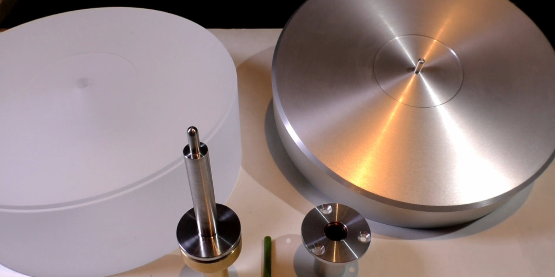 Влияние материала опорного диска винилового проигрывателя на звук.