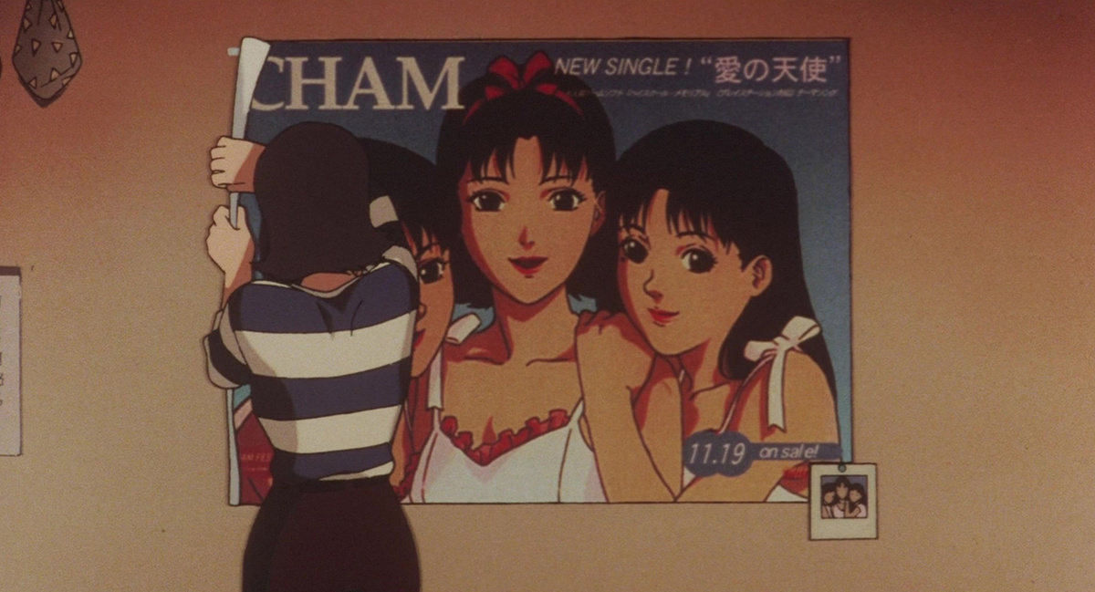 Мима снимает постер группы CHAM! со стены своей квартиры — символ прощания с прошлой жизнью идола. Кадр из аниме Perfect Blue (1997), студия Madhouse. © Madhouse / Rex Entertainment