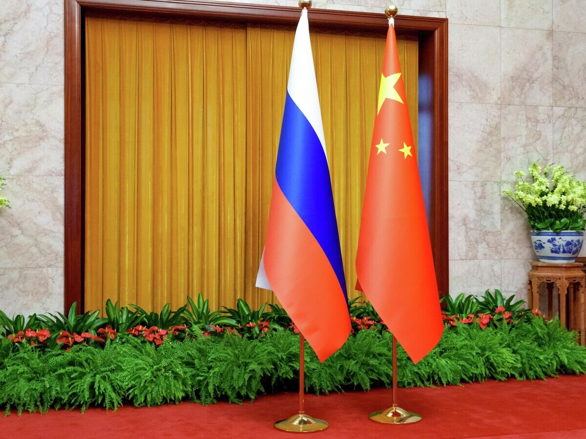    Флаги России и Китая | © РИА Новости / Анна Раткогло