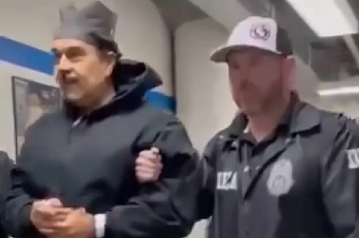    Появилось видео, где Мадуро в наручниках улыбается и поздравляет всех