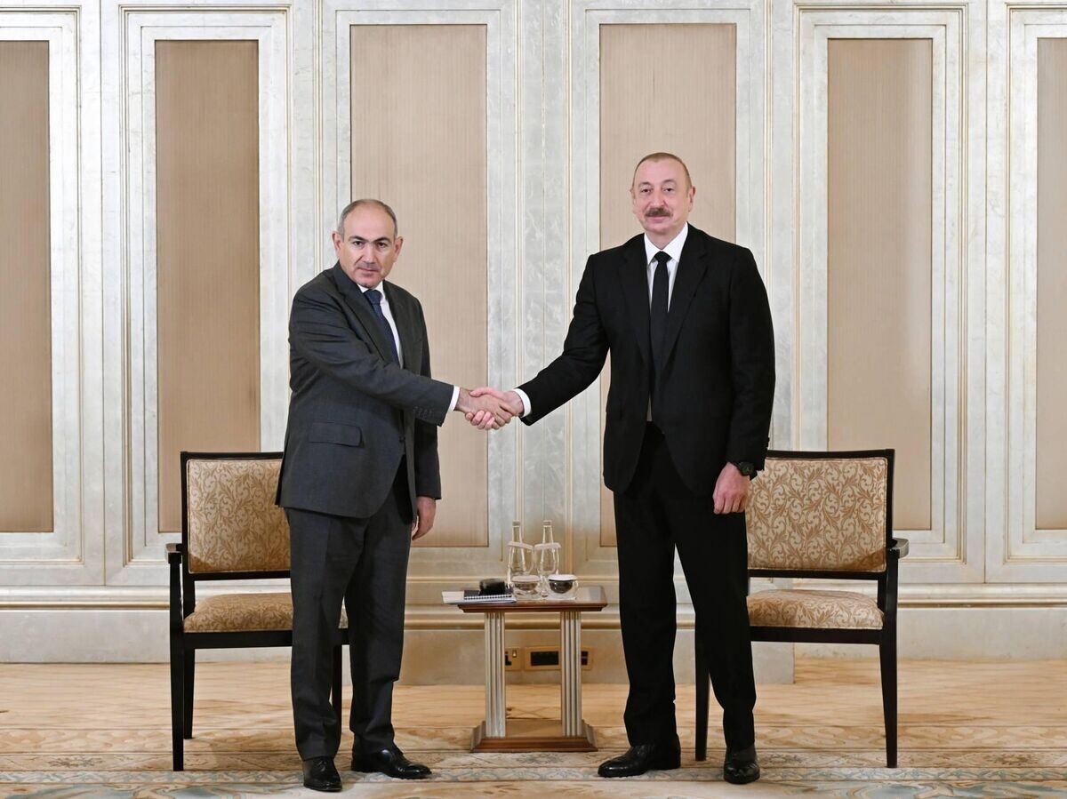    Премьер-министр Армении Никол Пашинян и президент Азербайджана Ильхам Алиев на встрече в Абу-Даби | © РИА Новости / Пресс-служба президента Азербайджана