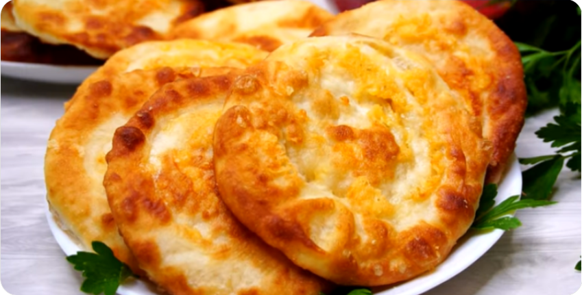 С такими лепешками и хлеб не нужен, готовлю (без дрожжей) за считанные минуты, расходятся в один миг, напоминают хачапури, семья обожает...