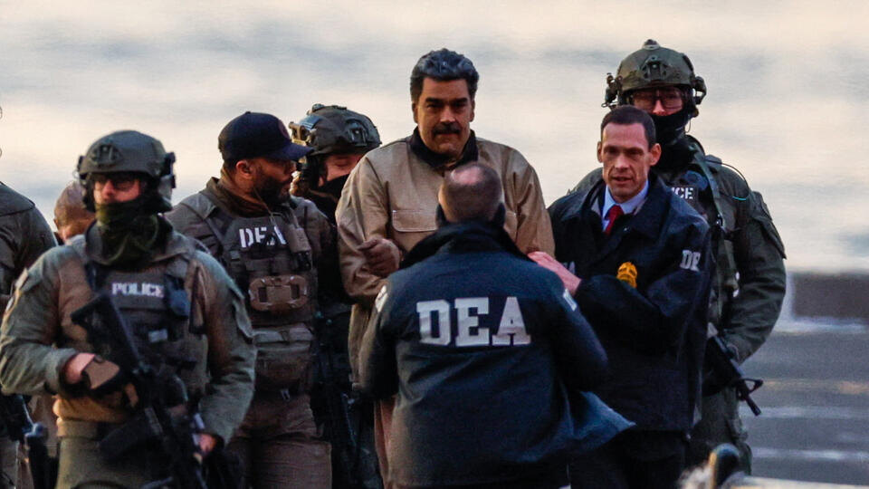     Возили по городу, как в клетке: в США начинается суд над Мадуро REUTERS/Eduardo Munoz