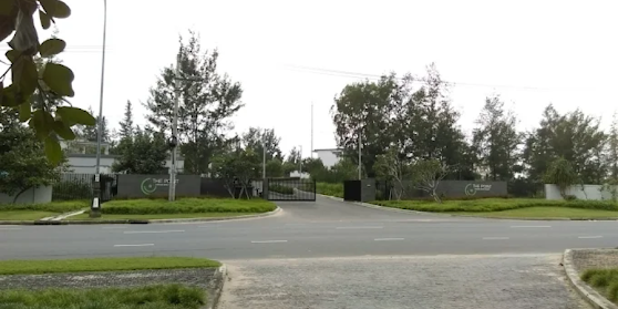 Gated Community Entrance with Lush Landscaping