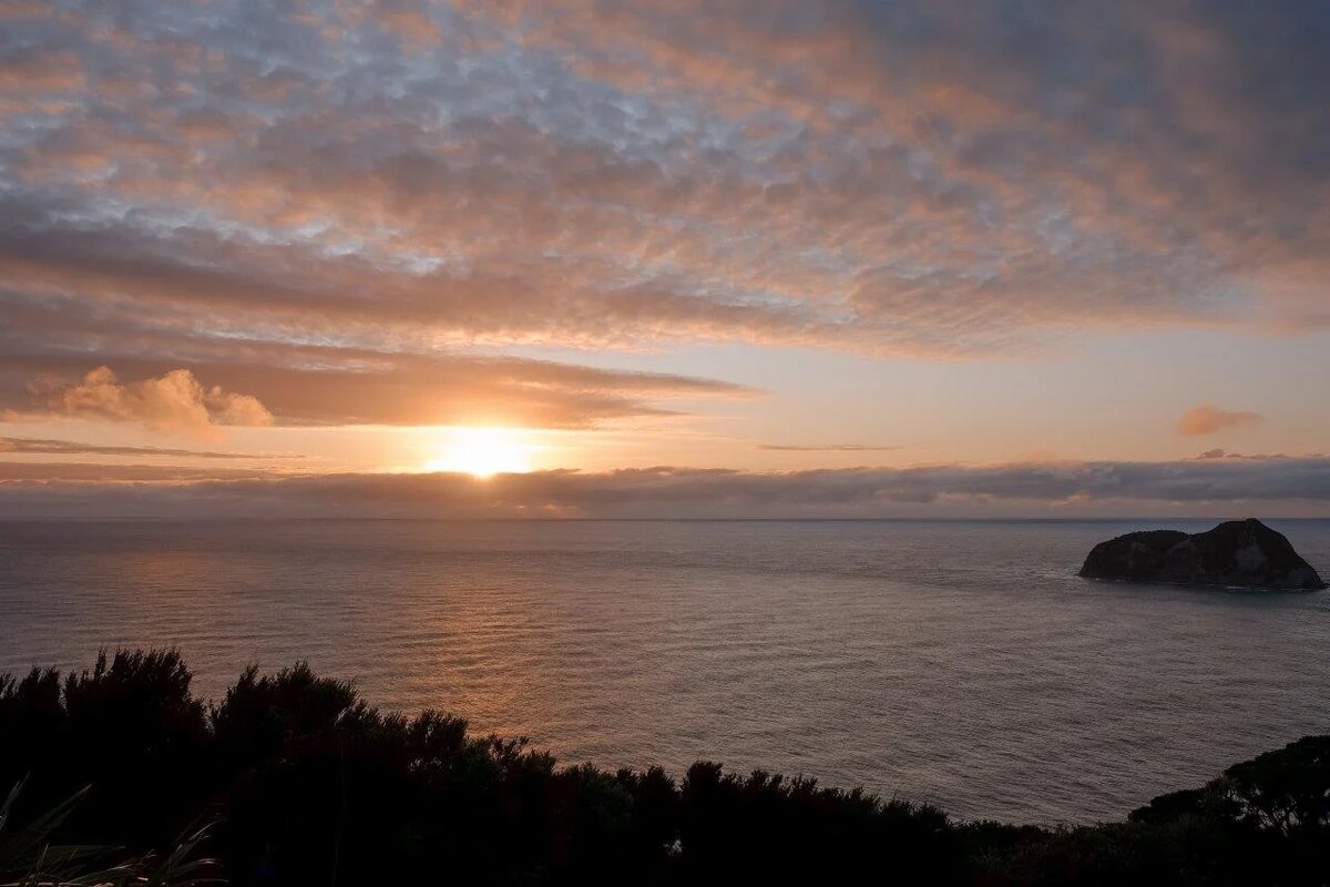 Рассвет в районе East Cape.