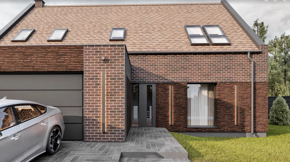 Дом обшит фасадными панелями коллекции "Кирпич" и "Терра"