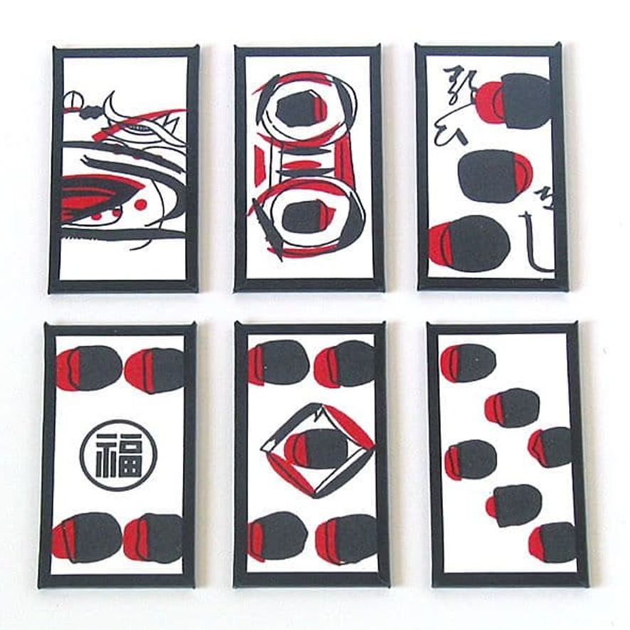 Один из вариантов дилерской курифуды. Конкретно этот образец изготовлен компанией Нинтендо, поскольку на четверке изображен обведенный иероглиф "счастье" или "благосостояние. Такой символ называется "маруфуку" и является зарегистрированой торговой маркой компании.