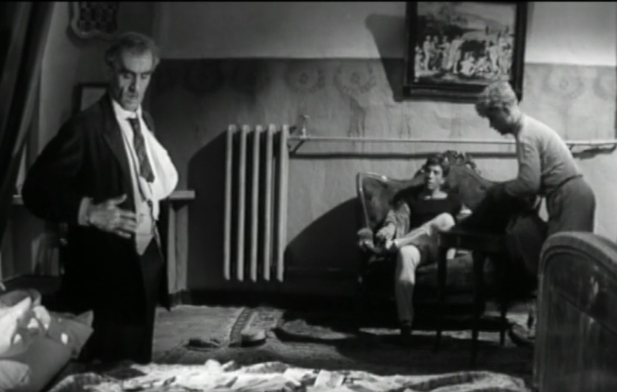 Кадр из кинофильма «Золотой теленок» (1968). Остап Бендер сидит в кресле под картиной "Явление Христа народу".