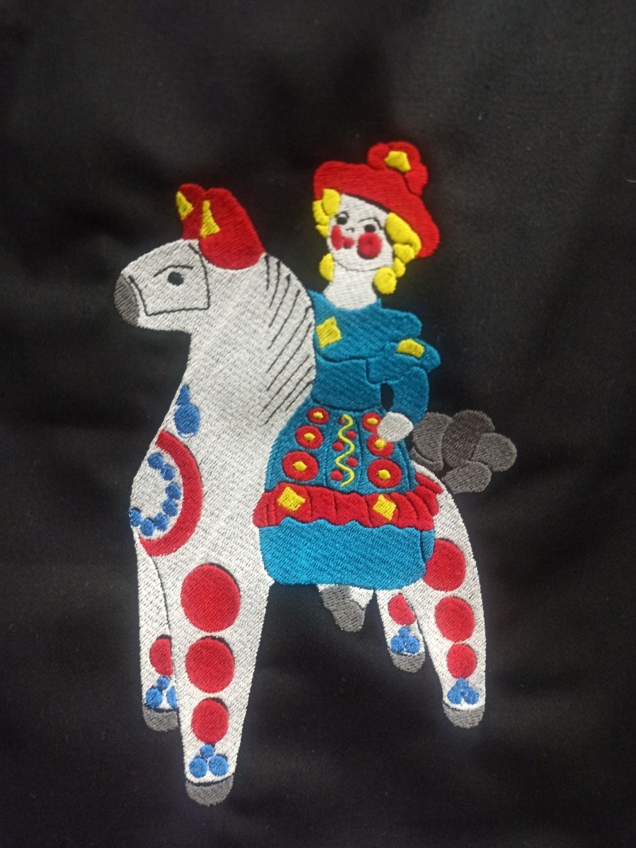 Наша первая работа в стиле дымковской игрушки "Наездница".