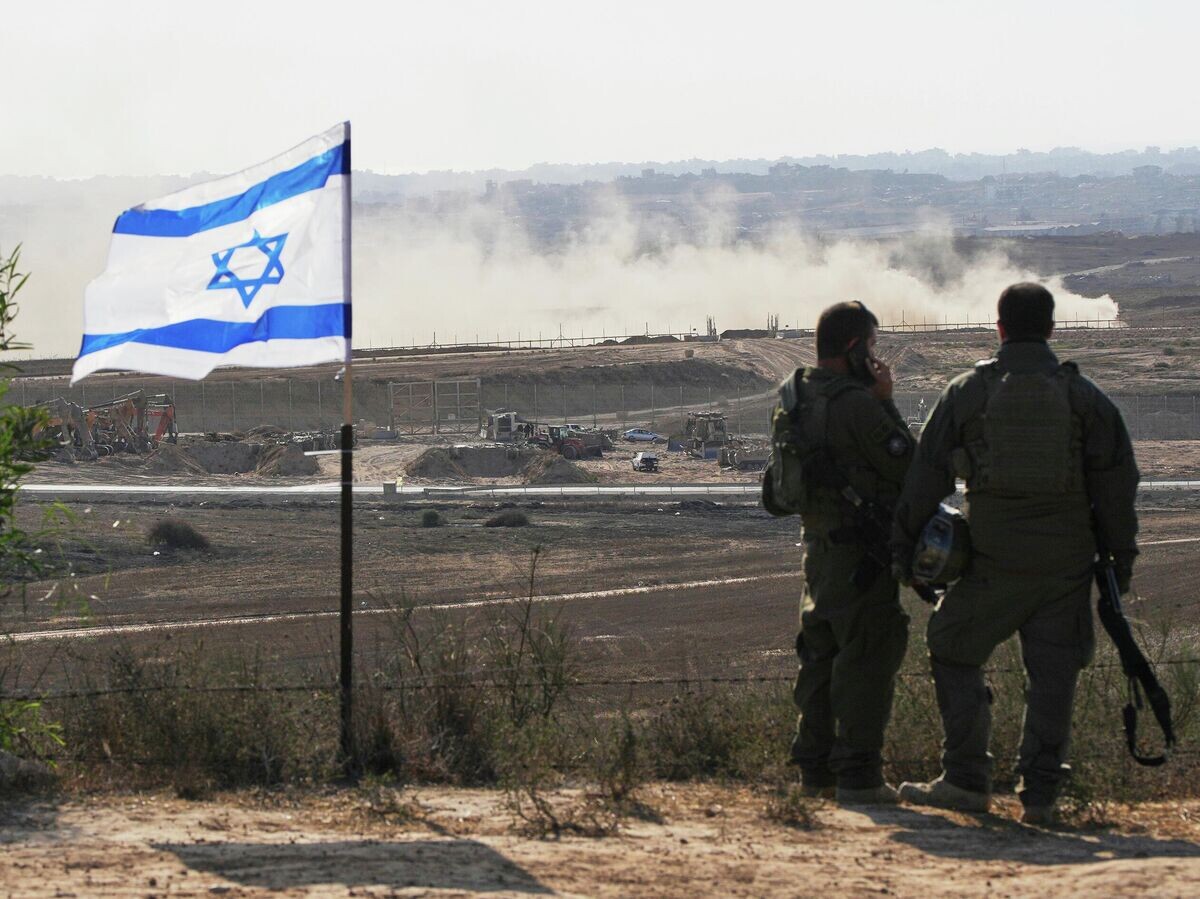    Израильские военные в районе границы с сектором Газа | © AP Photo / Ohad Zwigenberg