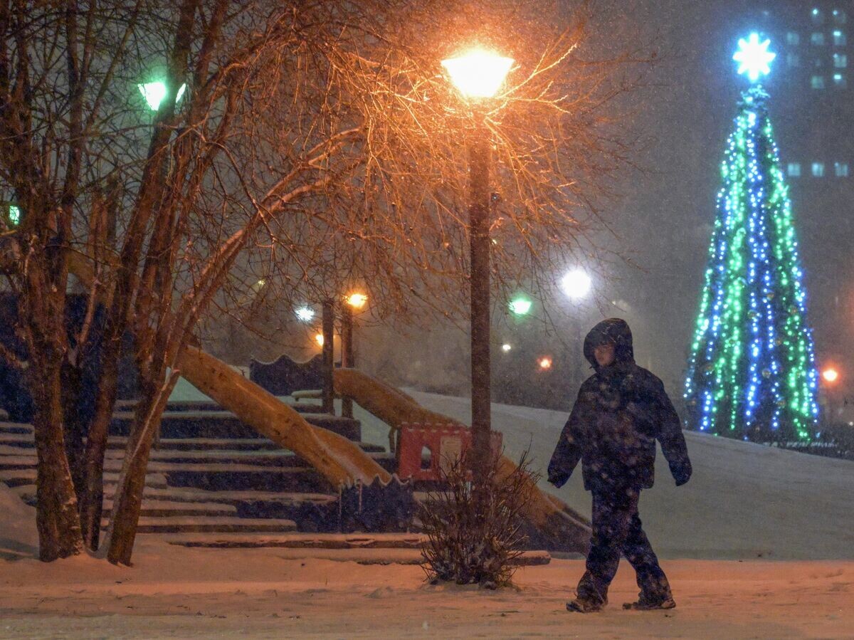    Прохожие во время снегопада в Москве | © РИА Новости / Алексей Никольский