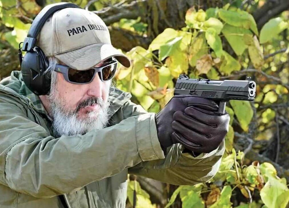 Пистолет в руке.