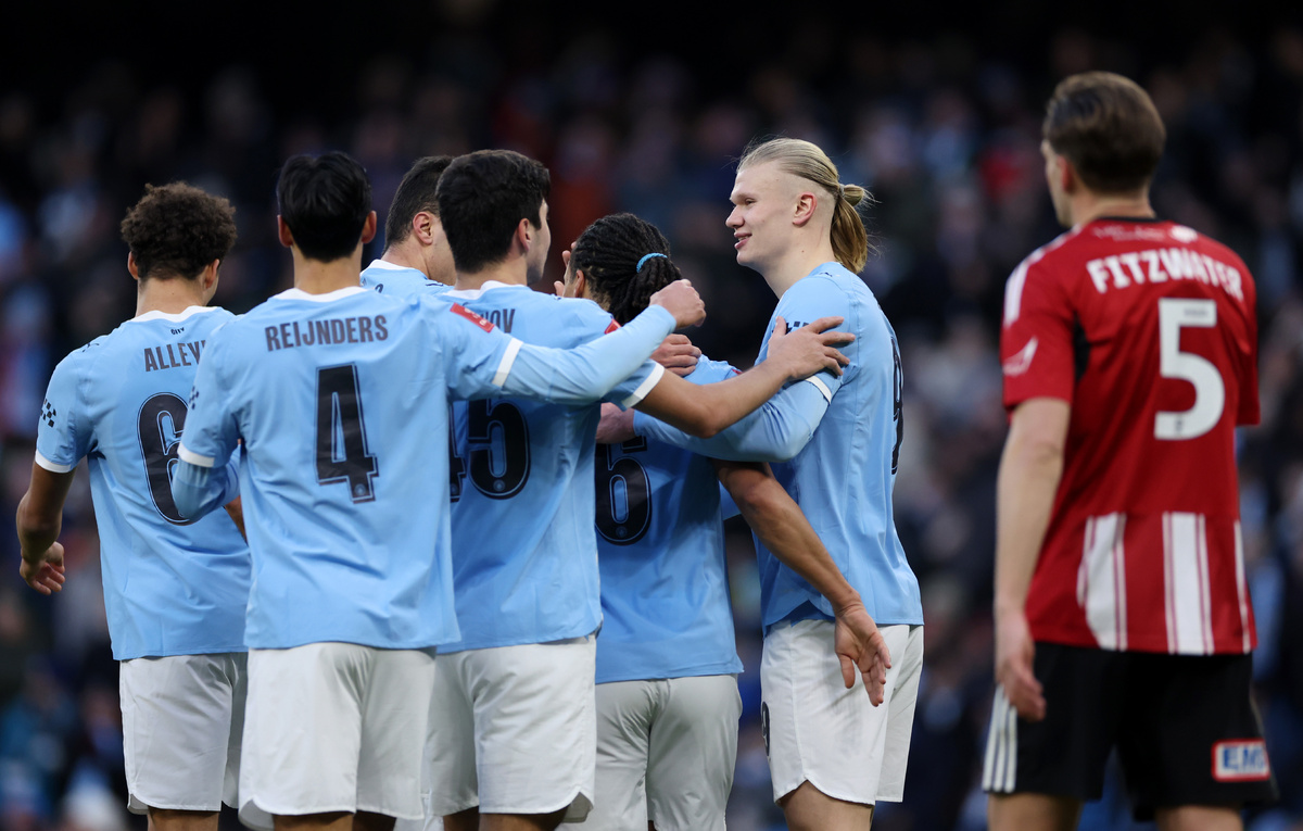    Футболисты "Манчестер Сити"  Lewis Storey/Getty Images