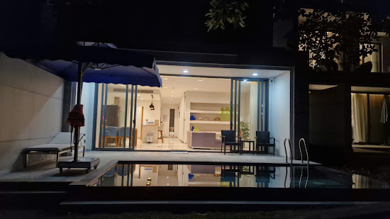 Exterior view of The Point Da Nang Villa with private pool and golf course.