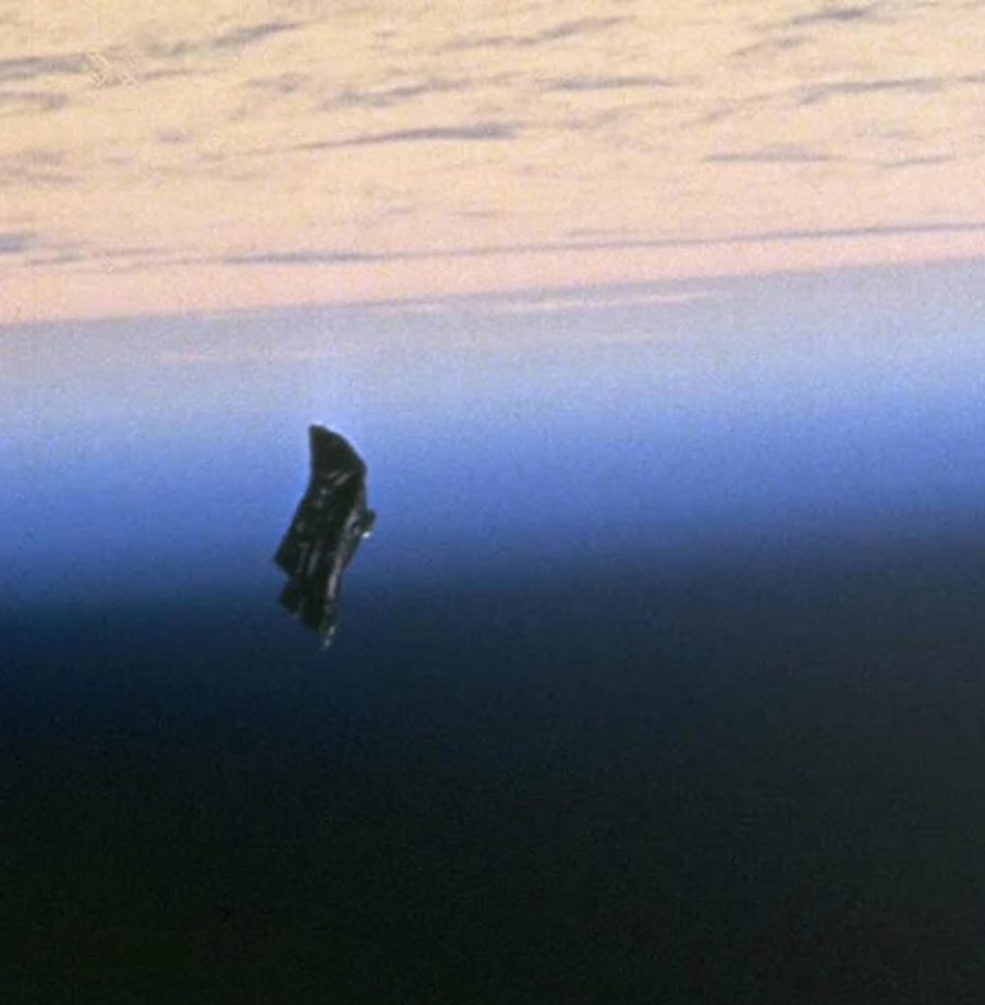 Detail of NASA photo id STS088-724-66 taken during Space Shuttle mission STS-88, described as showing an item of "space debris", an object claimed by conspiracy theorists to be an alien satellite, the Black Knight.