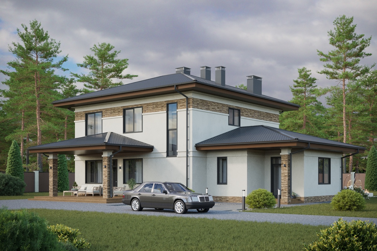 Двухэтажный дом из газобетона в классическом стиле.