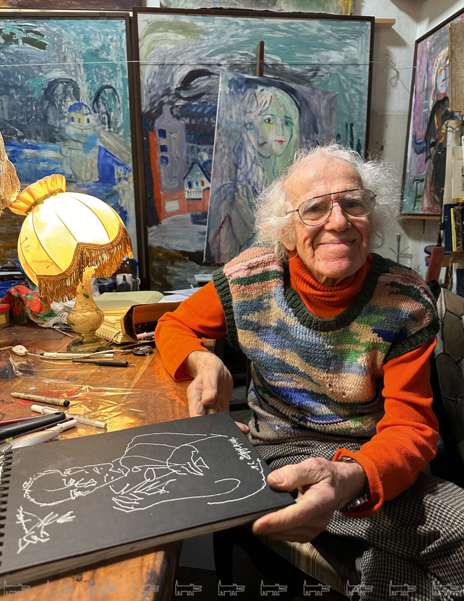    Александр Траугот рисует Якова Друскина (белым по черному! по памяти как с натуры!) в своей мастерской на улице Блохина Фото: Юлия Машнич