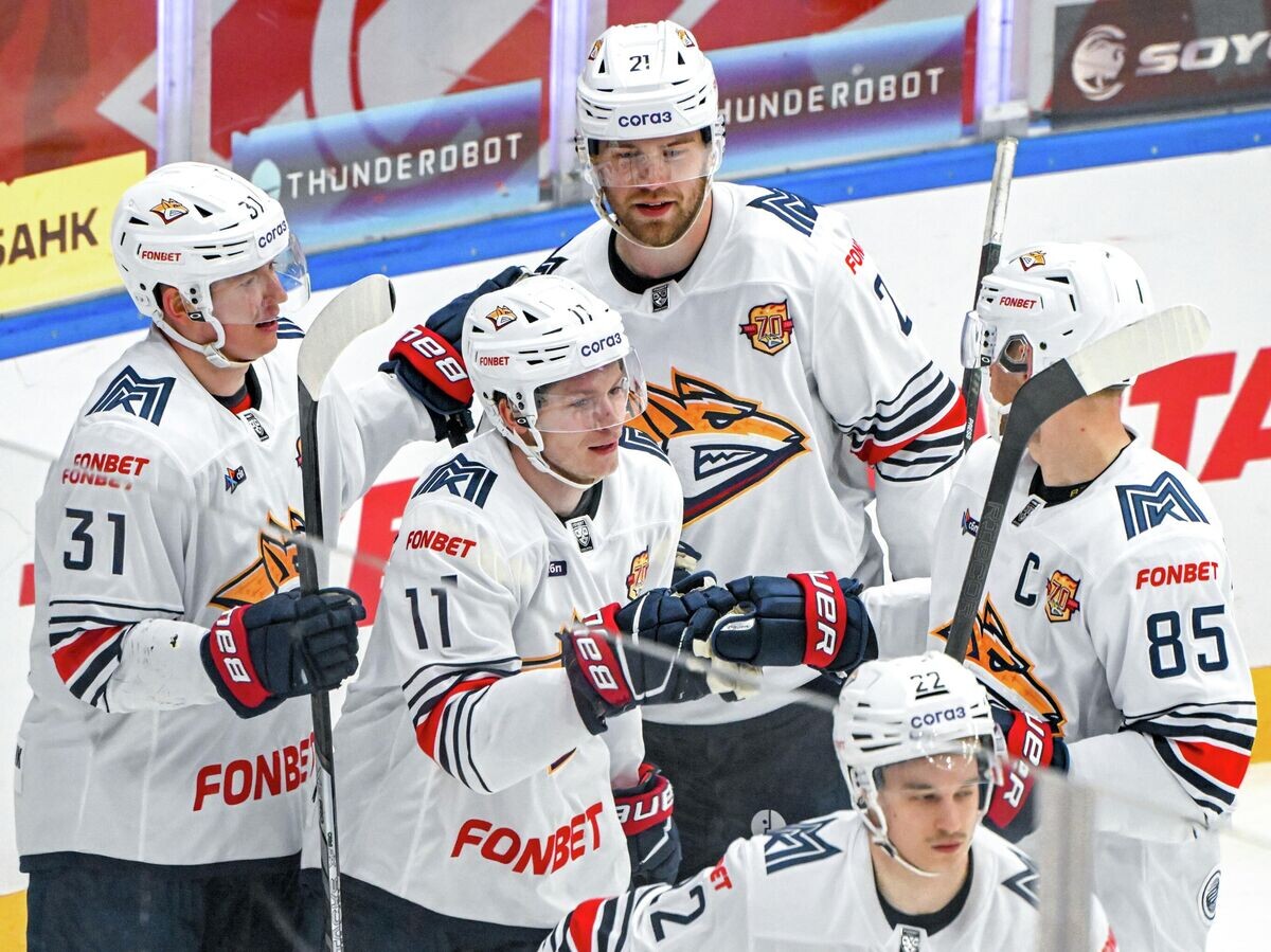    Игроки ХК "Металлург" | © РИА Новости / Сергей Гунеев