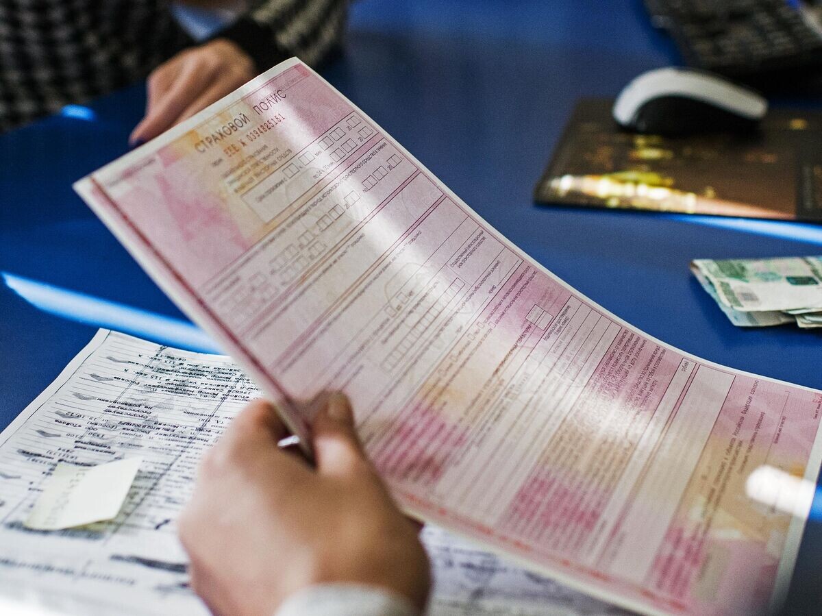    Оформление ОСАГО | © РИА Новости / Алексей Мальгавко