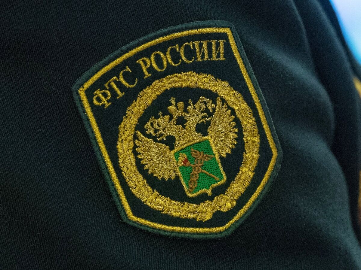   Шеврон на форме сотрудника Федеральной таможенной службы России© РИА Новости . Илья Питалев